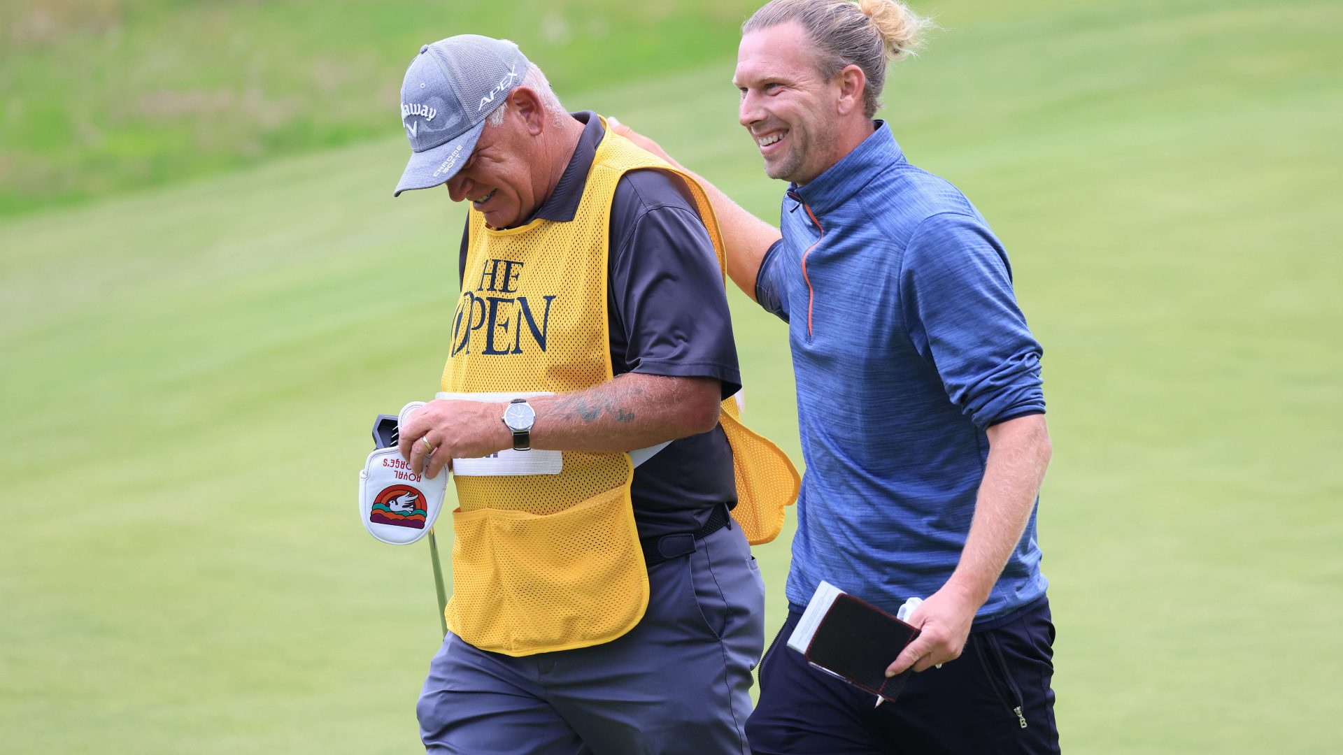 SANDWICH, ENGLAND - JULY 15: Marcel Siem of Germany reacts with his caddie as he walks off the 18th green after making a birdie during Day One of The 149th Open at Royal St George’s Golf Club on July 15, 2021 in Sandwich, England. (Photo by Chris Trotman/Getty Images)