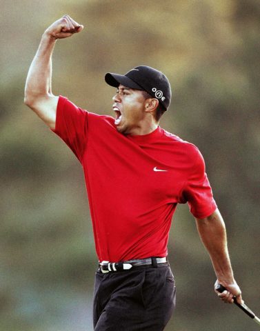 Tiger Woods of the US celebrates winning