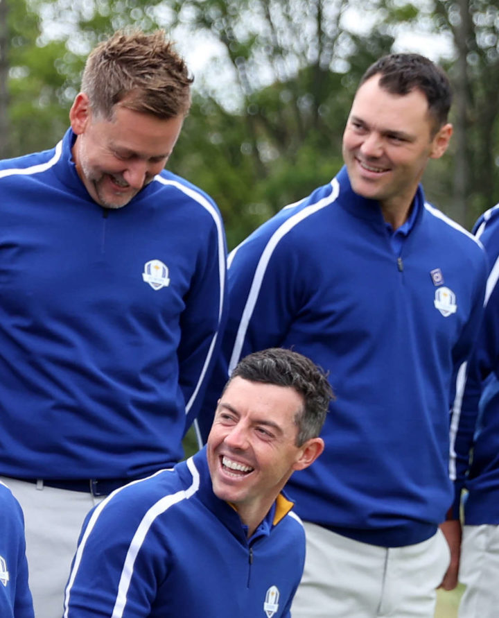 KOHLER, WISCONSIN - SEPTEMBER 21: (Back L-R) Viktor Hovland of Norway and team Europe, Tyrrell Hatton of England and team Europe, Shane Lowry of Ireland and team Europe, Ian Poulter of England and team Europe, Vice-captain Martin Kaymer of Germany and team Europe, (Front L-R) Lee Westwood of England and team Europe, captain Padraig Harrington of Ireland and team Europe, Sergio Garcia of Spain and team Europe, and Rory McIlroy of Northern Ireland and team Europe react during a team photo prior to the 43rd Ryder Cup at Whistling Straits on September 21, 2021 in Kohler, Wisconsin.