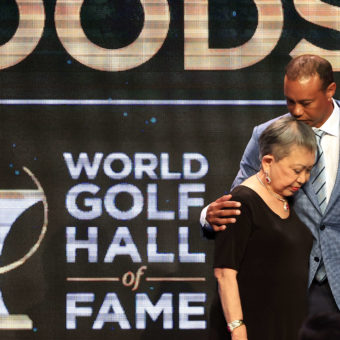 PONTE VEDRA BEACH, FLORIDA - MARCH 09: Tiger Woods and his mother Kultida Woods react as they pose for photos prior to his induction at the 2022 World Golf Hall of Fame Induction at the PGA TOUR Global Home on March 09, 2022 in Ponte Vedra Beach, Florida. (Photo by Sam Greenwood/Getty Images)