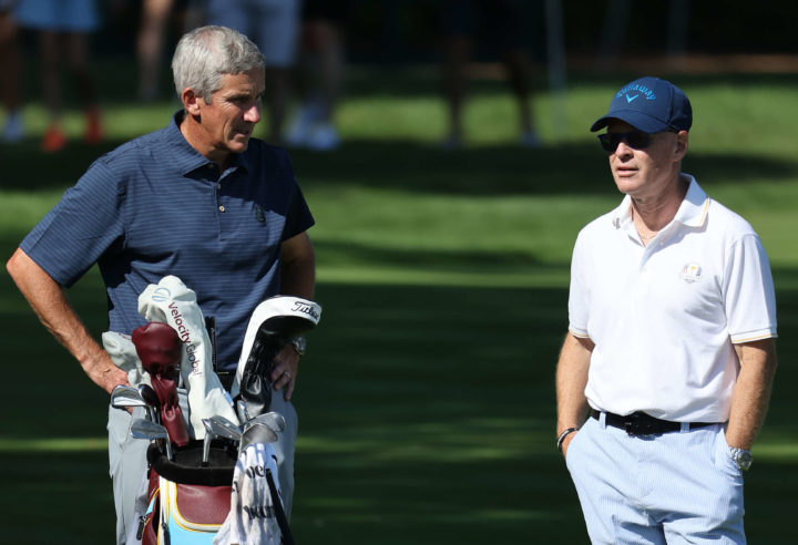 DUBAI, UNITED ARAB EMIRATES - JANUARY 31: Keith Pelley, CEO of the PGA European Tour, speaks to Lee Westwood of England on 1st tee during the final round of the Omega Dubai Desert Classic at Emirates Golf Club on January 31, 2021 in Dubai, United Arab Emirates. (Photo by Warren Little/Getty Images)